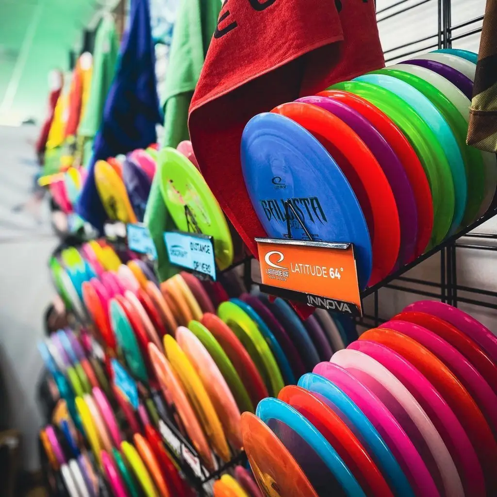 Colorful disc golf discs from Latitude 64 and Innova at Flowland